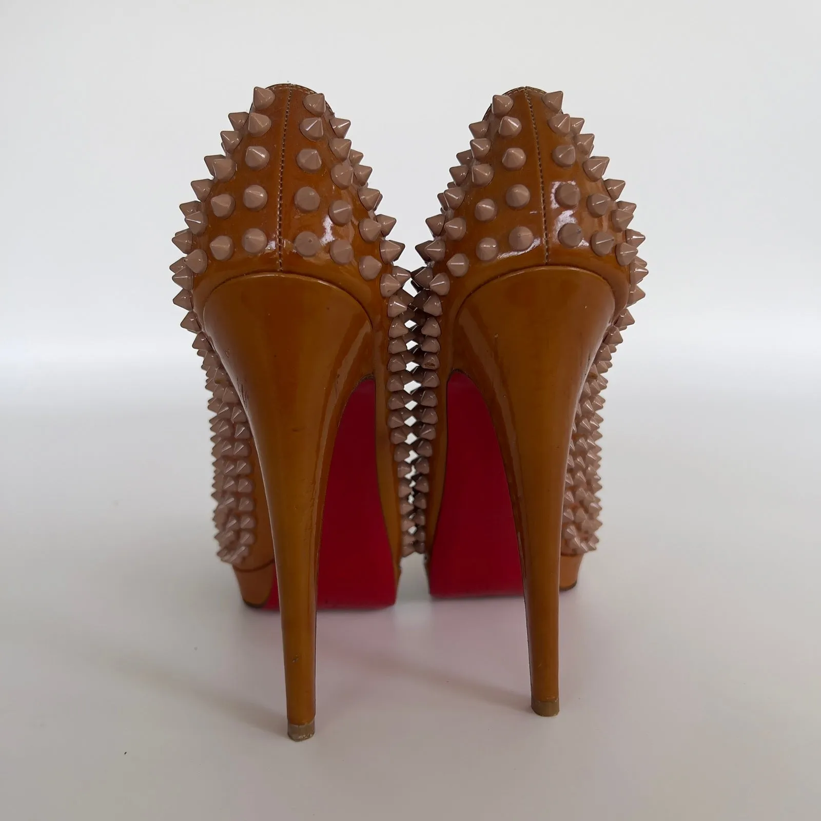 Clou Bow Spike Platform Slingback